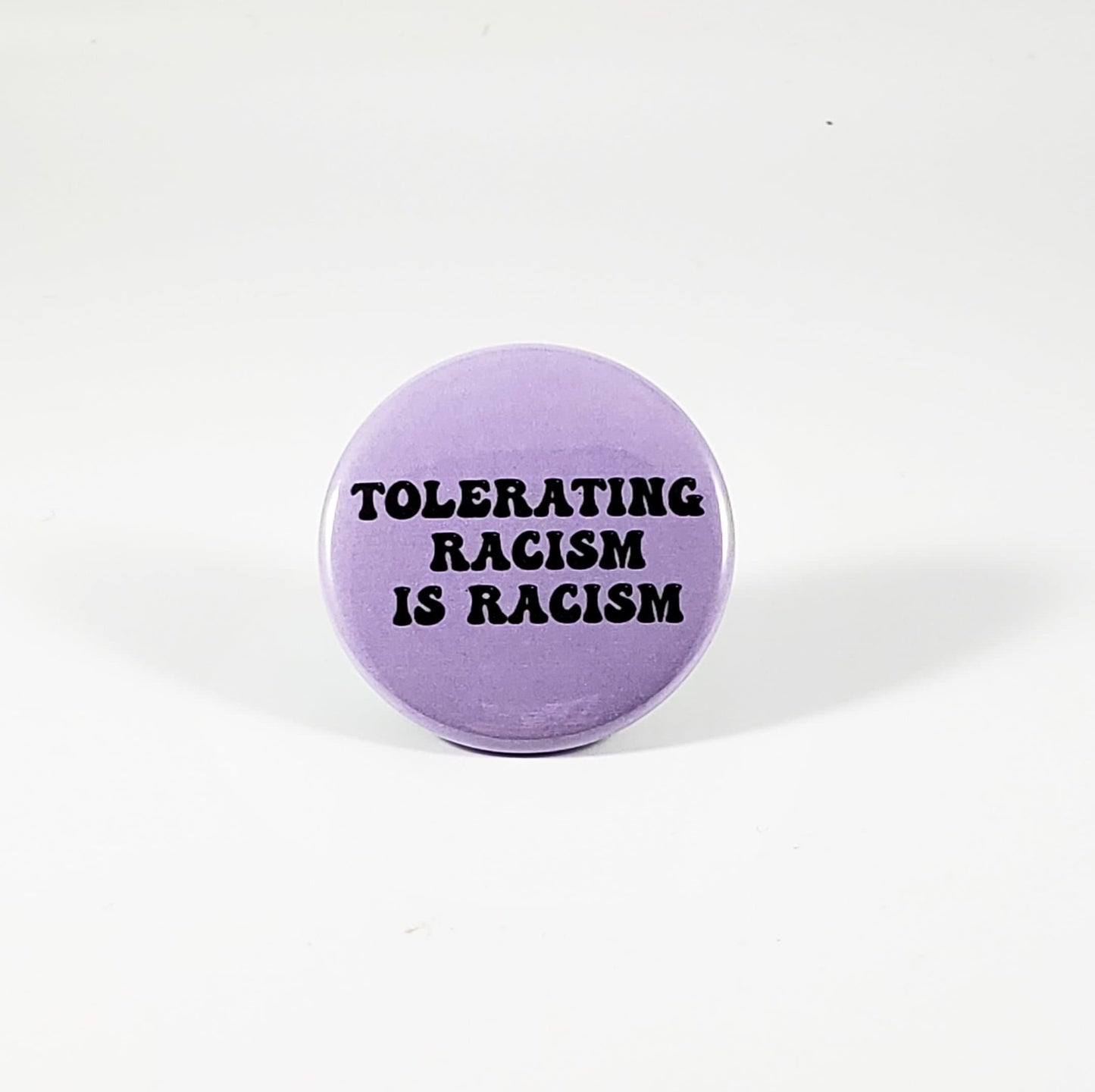 Tolerating racism is racism pin